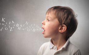 Child speaking and alphabet letters coming out of his mouth